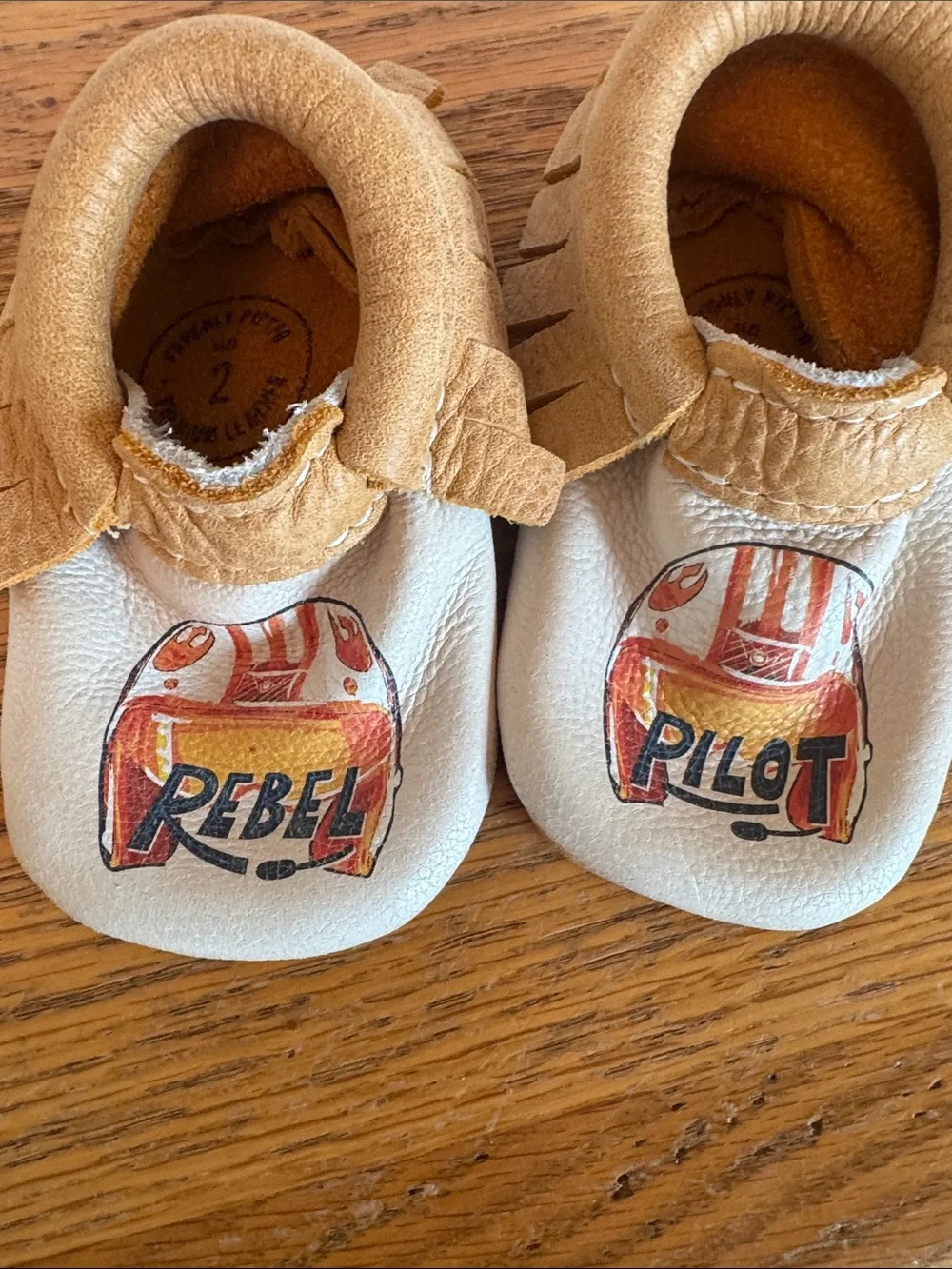 Freshly Picked Tan & White Moccasins with Rebel Pilot Graphic